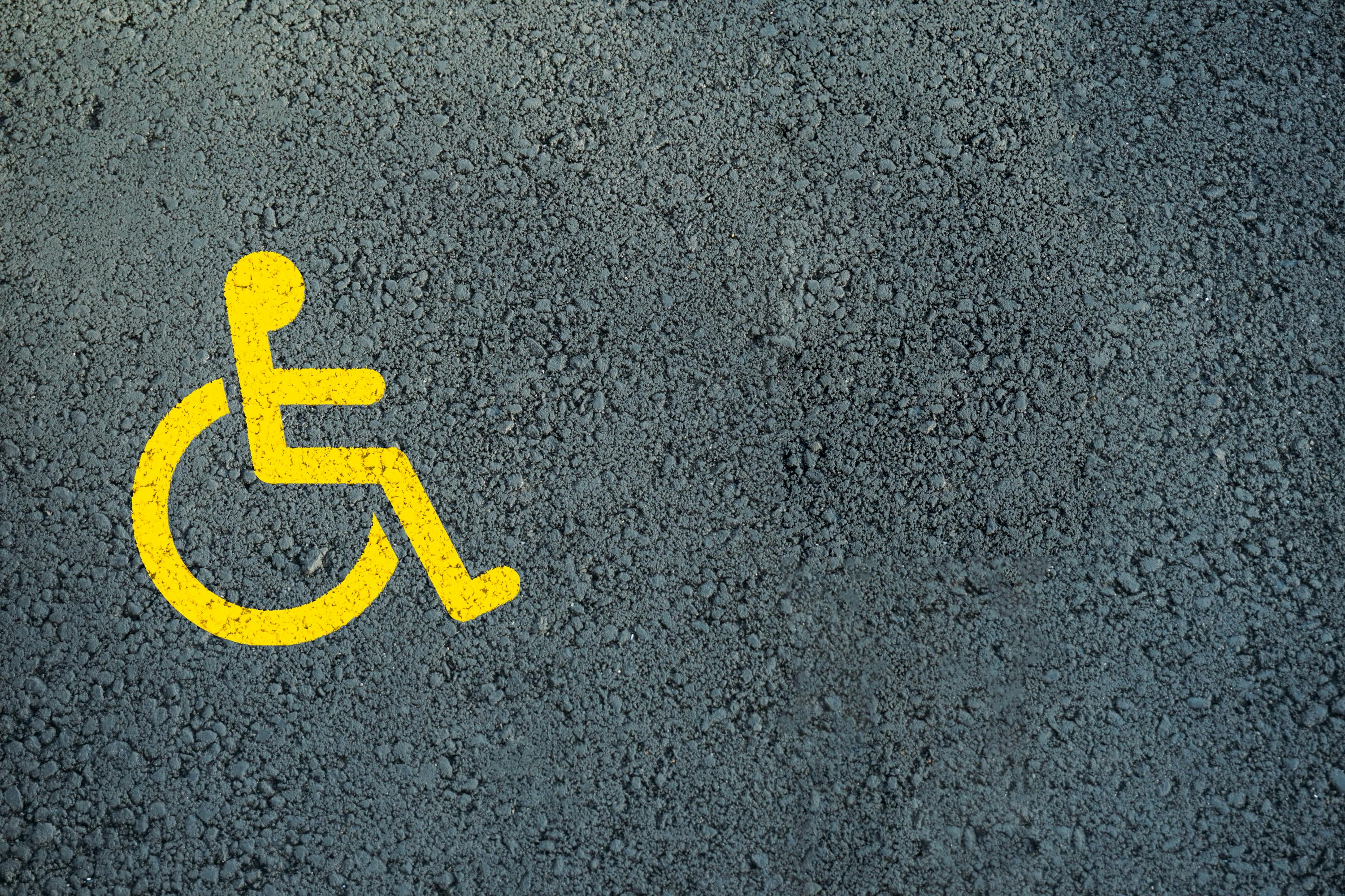 disability symbol on pavement