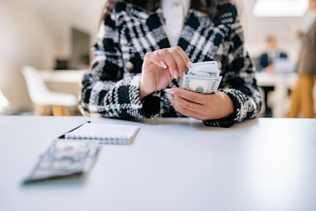 woman counting money